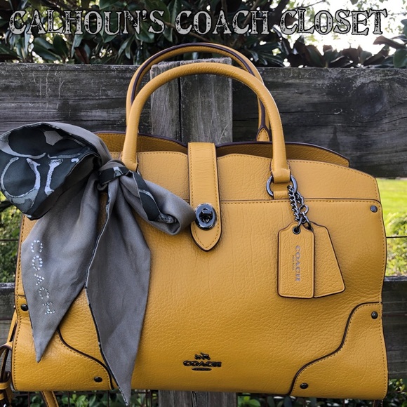 mustard coach purse